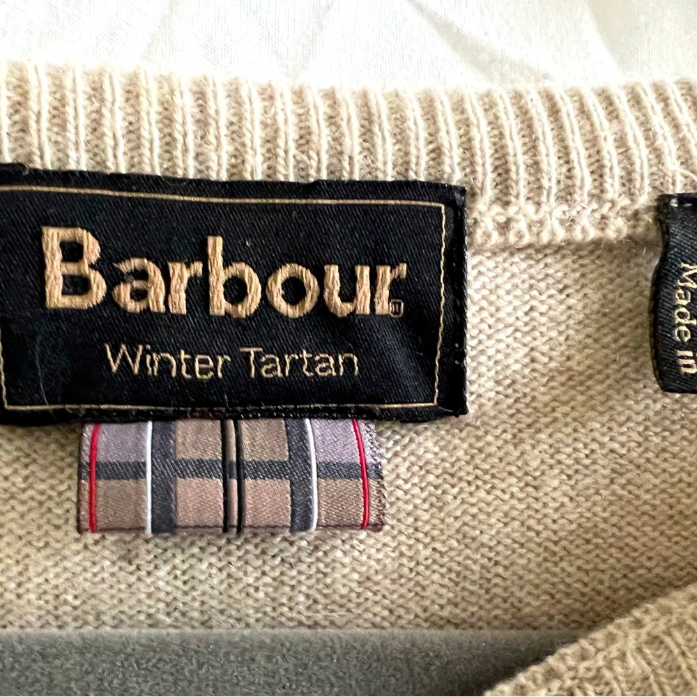 Barbour winter tartan sweater.